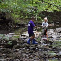 Kids in the creek at First State National Historic Park